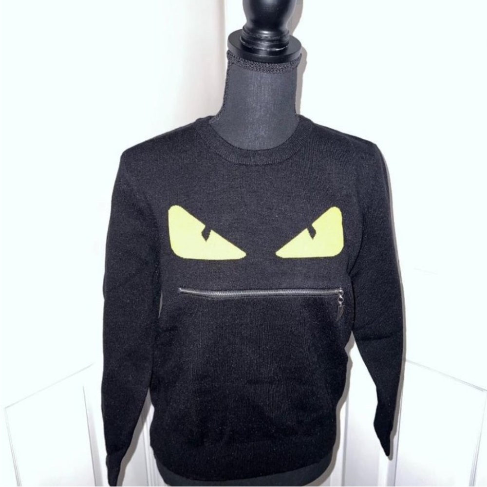 NWOT Black Sweater with Yellow Eye Design Size M